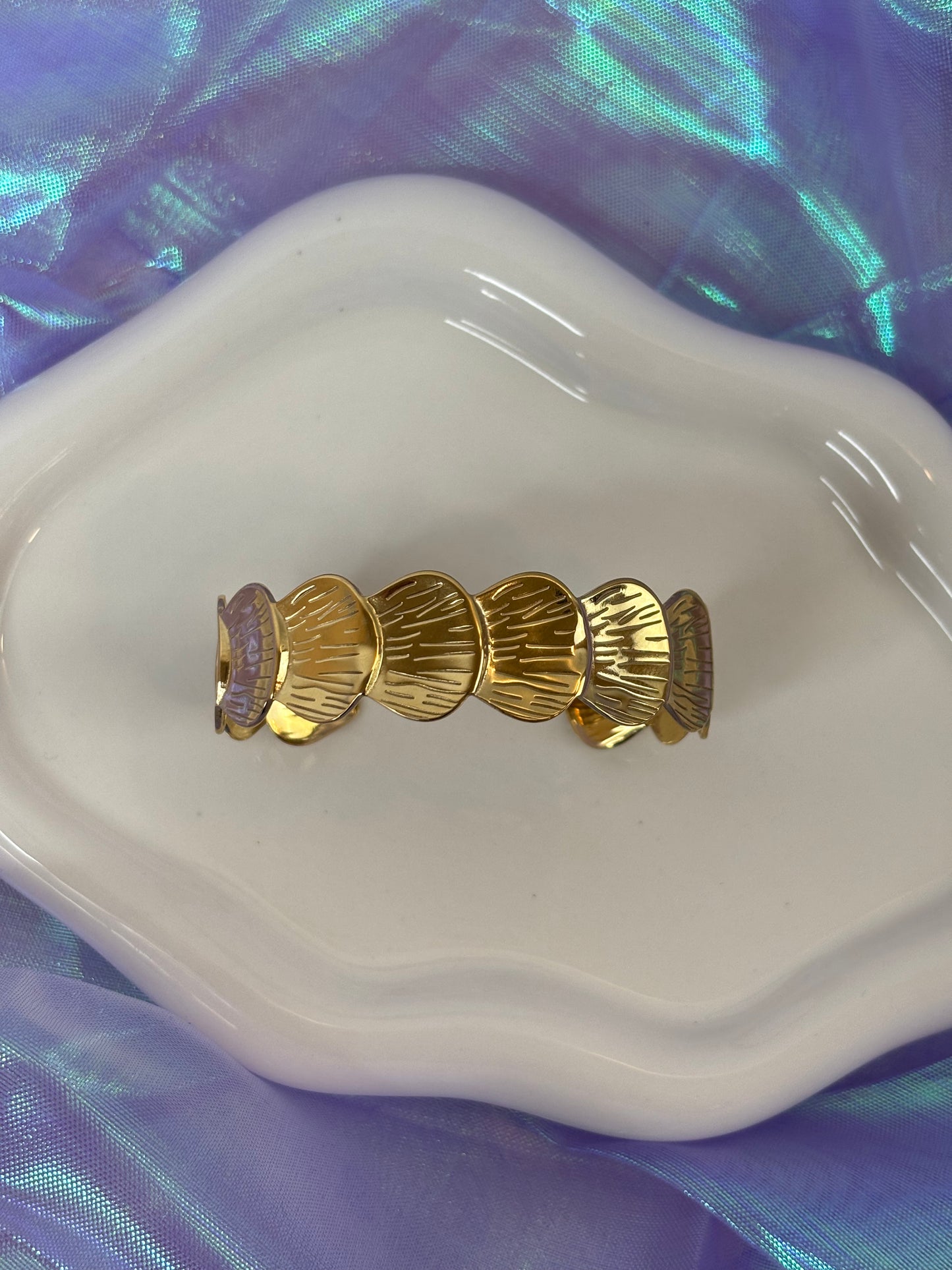 Bracciale rigido conchiglia