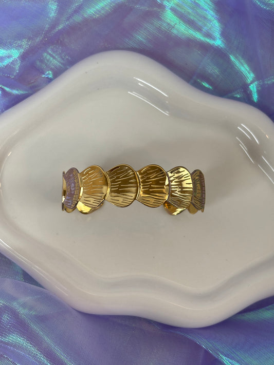Bracciale rigido conchiglia